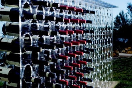 clear acrlyic wine rack with wine