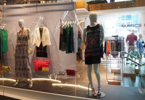 marcs retail store window display with acrylic hanger